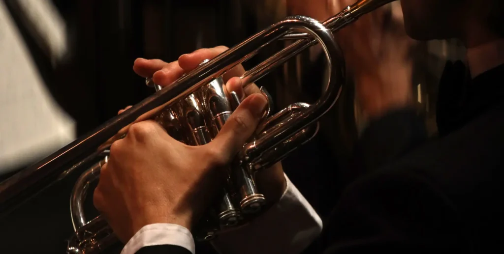 Trumpet being played.